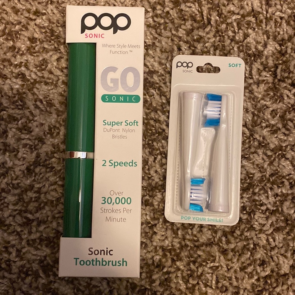 Pop sonic toothbrush with replacement heads